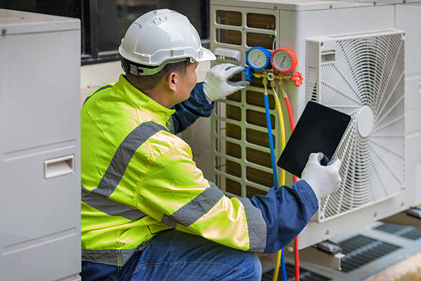 Professional Hvac technician working in Higley, AZ
